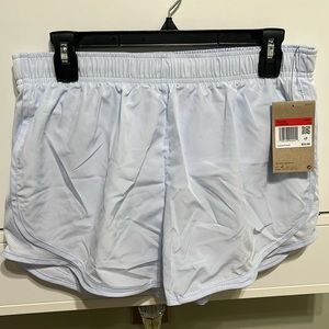 Women’s nike dri-fit tempo shorts size large lavender color.